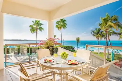 White House beachfront villa at Coral Gardens snorkeling reef