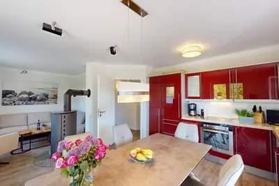 Image de Modern vacation apartment for 6 guests close to the beach with terrace, fireplace and sauna
