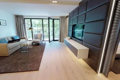 Image de Luxurious vacation apartment with sauna and balcony. Dogs welcome & very close to the beach!