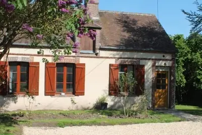 Image de Gîte cosy avec jardin, cheminée et vélos en Normandie