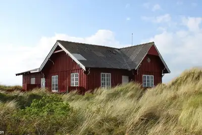 Image de Unique, over one hundred year old vacation home in 1st row to the beach