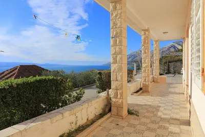 Image de Appartement de trois chambres avec la terrasse et la vue sur le mer Brela, Makarska (A-18495-b)