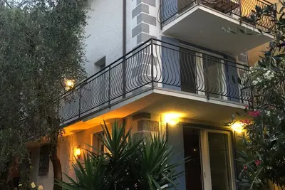 Image de House directly on Lake Garda, own harbor, pebble beach, 2 balconies with lake view