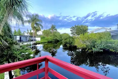 Waterfront house with a park and restaurant