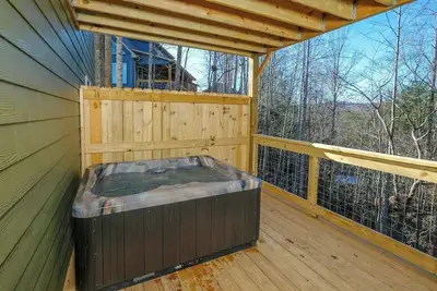 Wine Down - Sit fireside, play arcade games, shoot pool & soak in the hot tub!