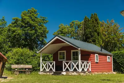 Luxury glamping is done in this colorful Scandinavian lodge.