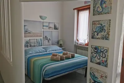 Two-room mini apartment a stone's throw from the sea with parking space