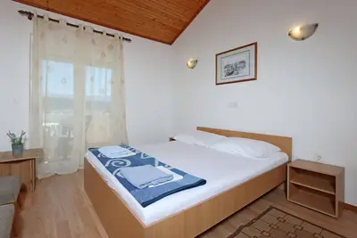 Image de Appartement de deux chambres prés de la plage Supetarska Draga - Gonar, Rab (A-18650-a)