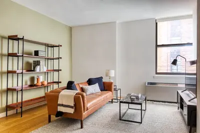Image de Modern FiDi 1br w/ Roofdeck, Gym, Doorman, by Blueground