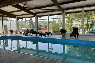 Image de Appartement dans une maison de vacances avec Wifi, piscine, Tv, terrasse, animaux admis, parking