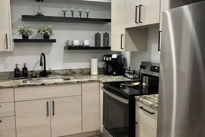 Image de A Cozy Mountain Retreat\nwith boat parking fun for the whole family.