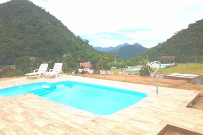 Image de Casa 5 SuĂtes, Piscina e Churrasqueira Privativas em TeresĂłpolis