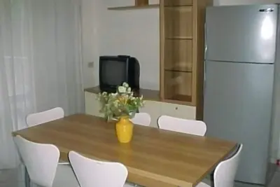 Image de Appartement de vacances Lignano Pineta pour 1 - 6 personnes avec 3 chambres à coucher - Logement de