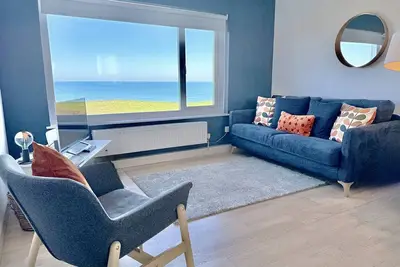 Image de 18 Coastline Court is a beautiful cliff top apartment with outstanding views across Newquay’s amazin