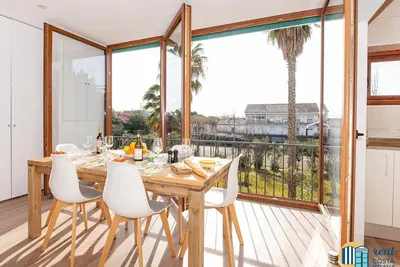 Image de Apartamento Las Palmeras central, moderne avec piscine commune