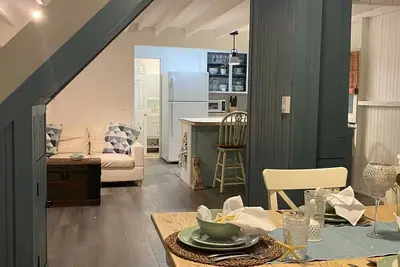Image de Pristine beach cottage just steps from the beach!