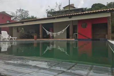 Image de BelĂssima Casa em ChĂŁ Grande com Piscina em CondomĂnio Fechado