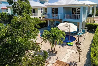 Image de Coastal Key 3 bed 2 bath with pool kayaks, bikes, paddlebooards and dock
