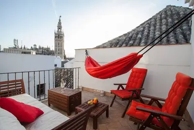 Image de Appart au coeur de la ville avec terrasse privée avec vue unique sur la Giralda