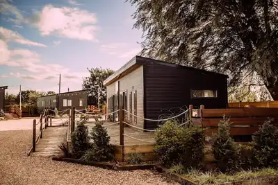 Image de A superior lodge 3 that sleeps 8 guests in 3 bedrooms