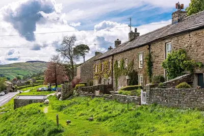 Image de A fantastic cottage, w/ free wifi, secure bike storage, stunning views & a stones throw from the pub