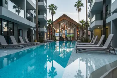 Image de B211 Palmyrah modern Condo- 2 pools, walk to beach