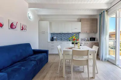 Image de Appartement de vacances \"Sa Domo Mea Isola Rossa\" avec vue sur mer et climatisation