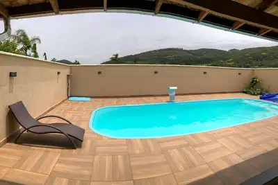 Image de Cantinho da Familia - House with pool in Penha close to the Beto Carrero park