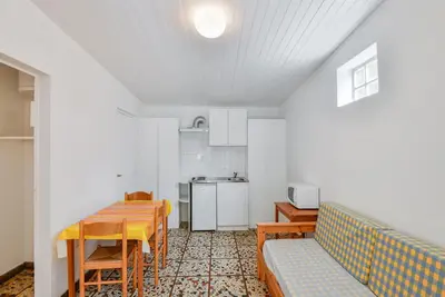 Image de Gîte dans un parc de vacances avec piscine