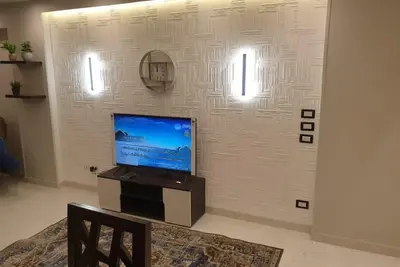 Image de New apartment Almohandessin near Shehab street