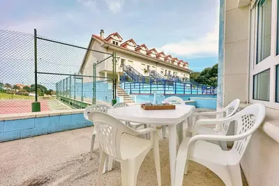 Image de Apartamento con terraza  y piscina - La Arena 4203