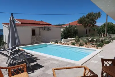 Image de Bel appartement pour 4 personnes avec Wifi, climatisation, piscine, Tv, terrasse et animaux admis