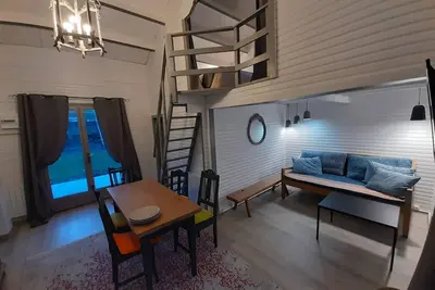 Image de gîte   dans un grand jardin   au sein d'un paisible village