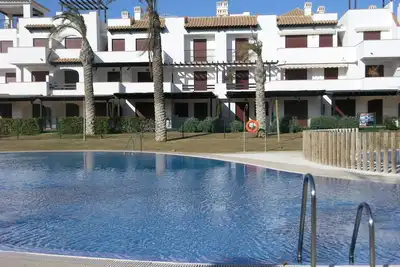 Image de Spacious 2 bed garden apartment, secure urbanisation, front line beach in Vera