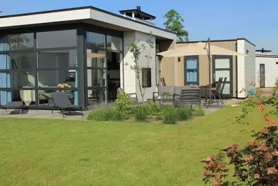 Image de Exclusive L-Cube with Airco, fenced garden and large S/W terrace