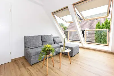 Image de Ferienwohnung Flut - Meeresleuchten in Neuharlingersiel