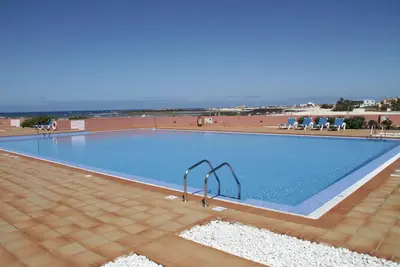 Image de vue sur la mer appartement et luxueusement meublé sur la plage de sable de Los Lagos + Wlan