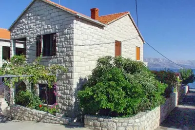 Appartement de deux chambres avec la terrasse et la vue sur le mer Postira, Brac (A-737-b)