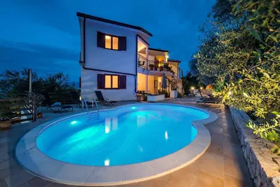 Image de Appartement de vacances avec vue sur la mer, piscine et jacuzzi