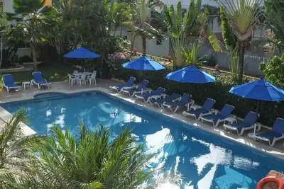 Image de Secure residence with pool, short walk from sandy beach and shops/restaurants