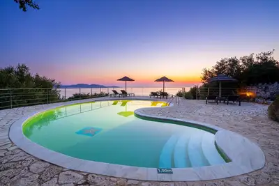 Image de Stone Cottages, Elia sea view-shared pool