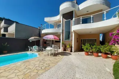 Image de Sobrado com Piscina em Condomínio Fechado