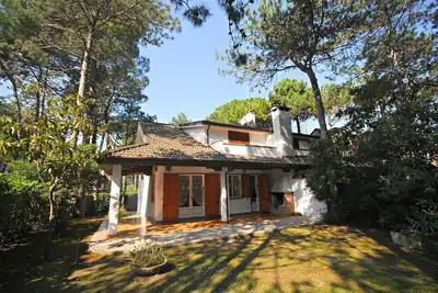 Image de Maison de vacances Lignano Pineta pour 1 - 7 personnes avec 4 chambres à coucher - Maison jumelée