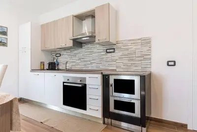 Image de Appartement \"Villa Vacanze Pink Lady\" avec vue sur montagne, terrasse privée et jardin partagé