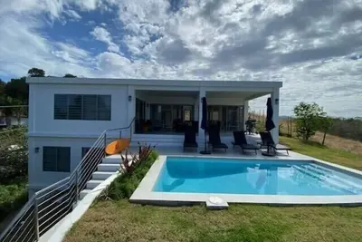 The Ranch At La Joya is a three bedroom modern farm house at Tres Palmas Estates