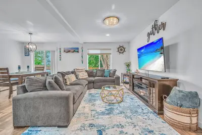Seaside Riverfront Home with Hot tub and Game room