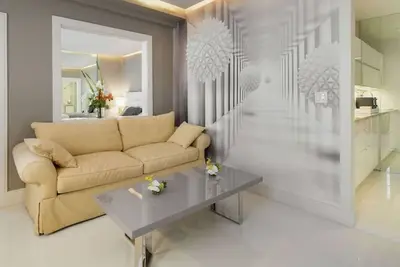 Image de White Orchid Apartment - Palm Beach - Pool - Beach