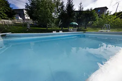 Image de Joli appartement avec Wifi, piscine privée, Tv, patio, animaux admis, vue panoramique et parking