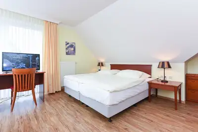 Image de Familienzimmer im Obergeschoss - Familienzimmer im Obergeschoss im Hotel Benser Watt