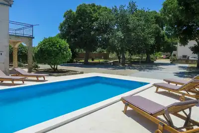 Image de Maison de vacances privée avec piscine privée, climatisation, Wifi, Tv, terrasse, animaux admis